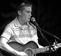 Anthony Playing his Acoustic and Singing